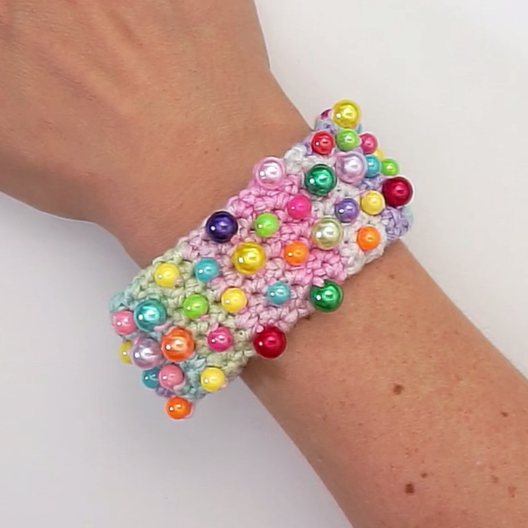 Crocheted armband with beads