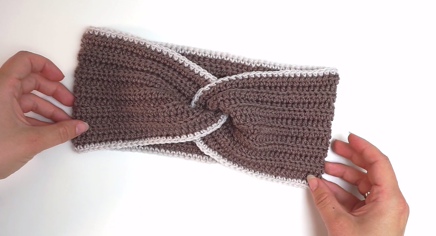 crocheted headband with a twist and an edge