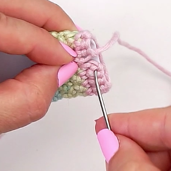 sewing the beaded bracelet together