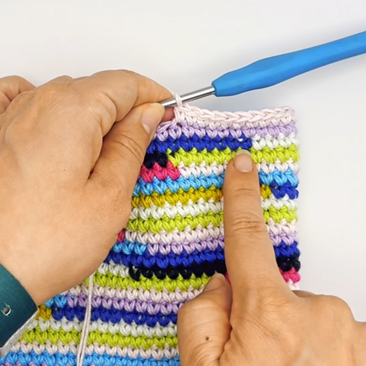 japanese knot bag crocheted in scrap yarn