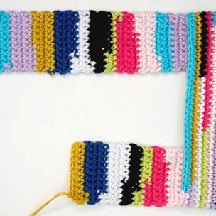 japanese knot bag crocheted in scrap yarn
