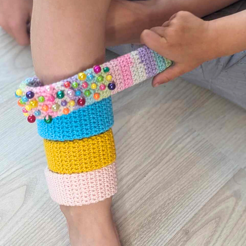 Kids playing with crocheted slap on bracelets