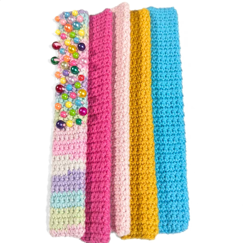 Different colored crocheted slap on bracelets