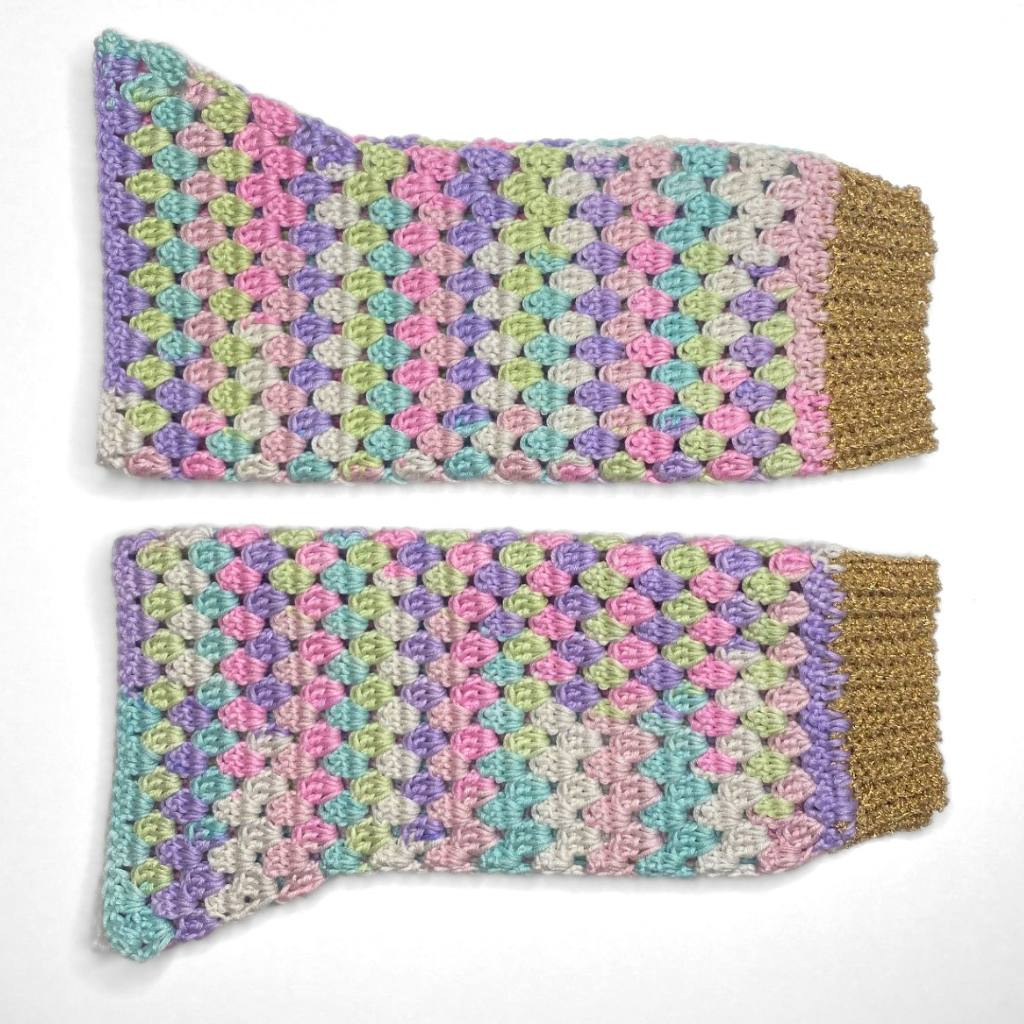 Granny stitch sweater crocheted in multicolored Acacia Yarn from Hobbii on a little girl