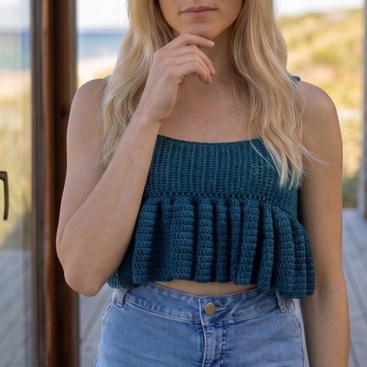 Crochet top with ruffles in metallic yarn