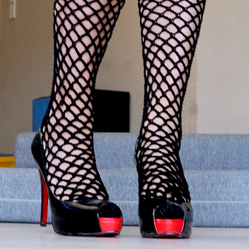 crocheted fishnet stockings in Louboutin shoes