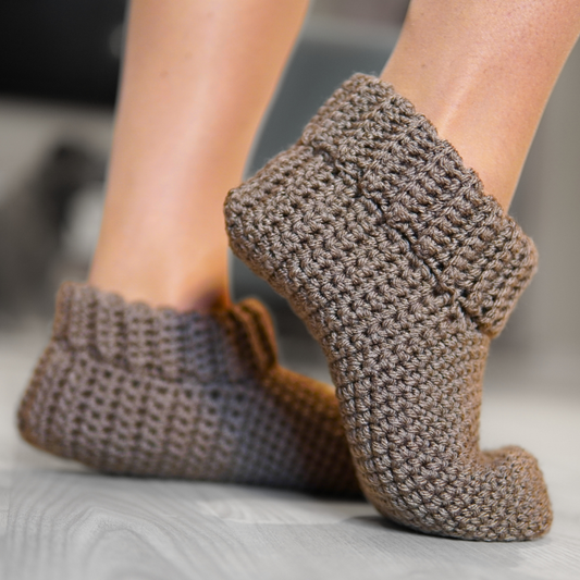 Crocheted slippers with a ribbing