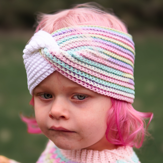 Crocheted headband ear warmer in two yarns with a twist in 3 sizes