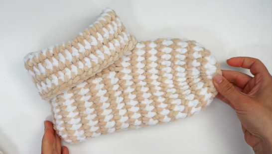 Beige and white chunky crochet bootie slipper made with super bulky yarn