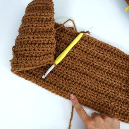 Close-up of crochet hooded scarf