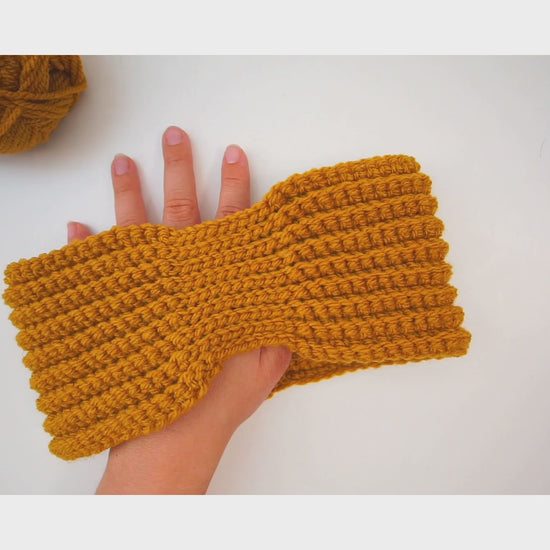 Learn to crochet a cozy headband with our easy-to-follow video tutorial