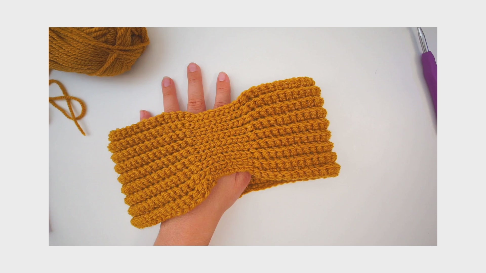 Learn to crochet a cozy headband with our easy-to-follow video tutorial